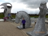 Kelpies with Falkirk Wheel in the background