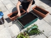 Glenn planting his herb garden!